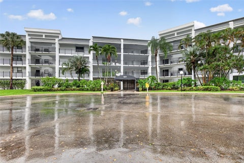 Photo of 16051 Blatt Blvd #106, Weston, FL 33326 (MLS # A12104698)