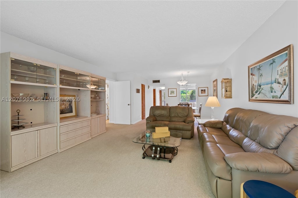 Photo of 8305 NW 61st St #C303, Tamarac, FL 33321 (MLS # A12076992)