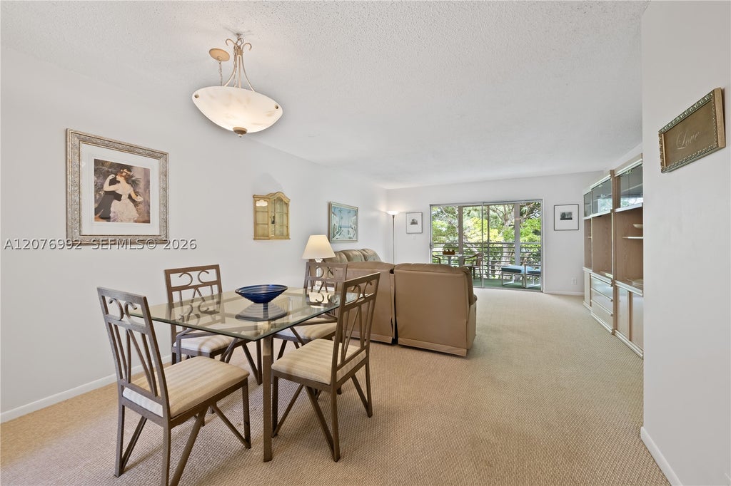 Photo of 8305 NW 61st St #C303, Tamarac, FL 33321 (MLS # A12076992)