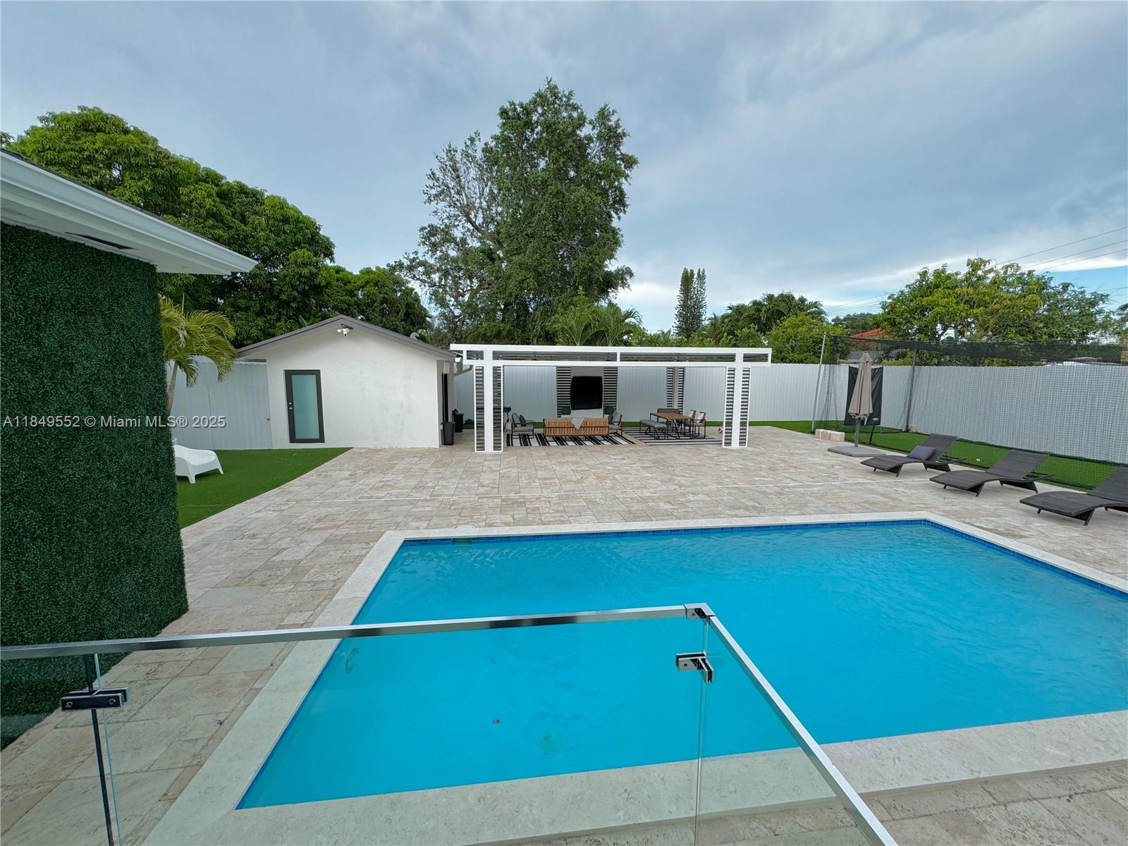 Elevate your lifestyle with this exquisite fully remodeled 3-bedroom, 3-bathroom estate in the heart of Miami. Perfectly positioned minutes from Miami Children Hospital as well as Coral Gables, this opulent residence is equip with a Tesla charging connection, a fun pool, and a great kids' playground area along with a modern aluminum Pergola. The property also features a sophisticated pool guest house and elegant living area, providing ultimate privacy and versatility with its proximity to major highways and unparalleled attention to detail, this home offers a blend of convenience and high-end living. Please contact broker for showings.