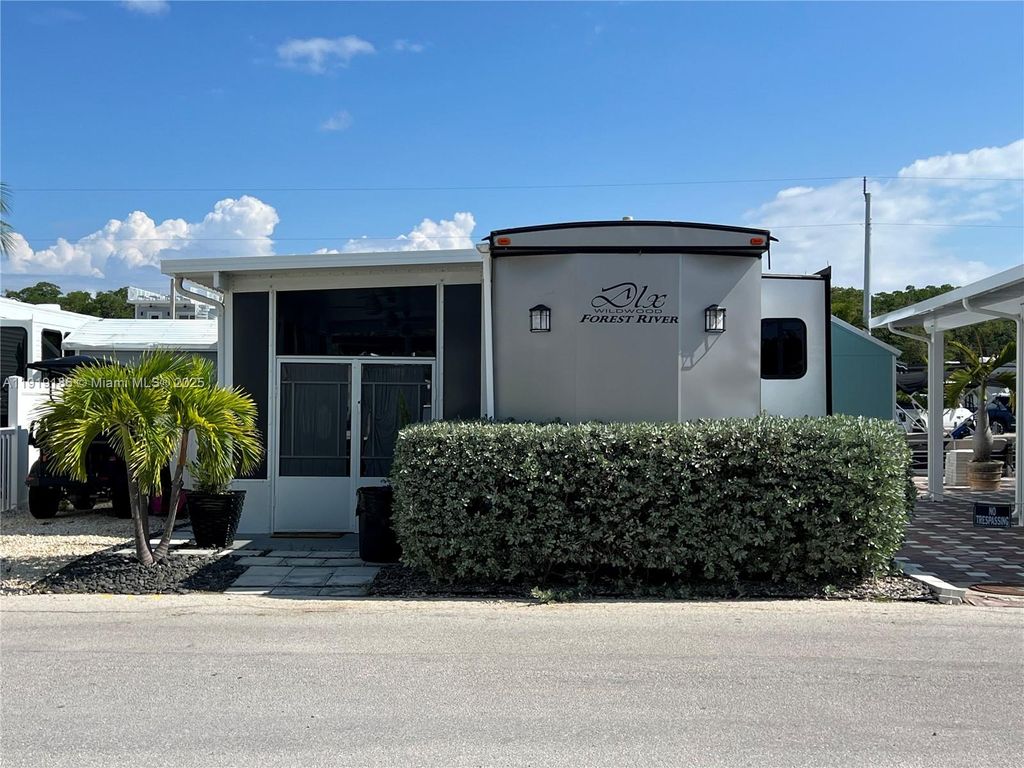 Photo of 325 Calusa Street, Key Largo, FL 33037 (MLS # A11919186)