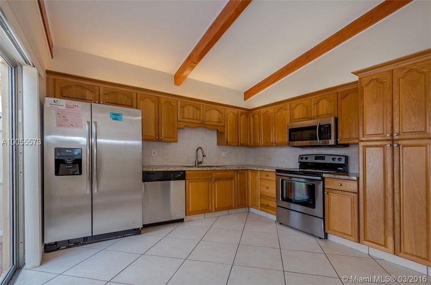 Beautiful 2 bedroom 2 bathroom apt at Villas at Carriage Hills in Hollywood.&#xD;&#xA;High ceilings detailed with gorgeous wood beams. Updated kitchen with stainless steel appliances, new wood floors in both bedrooms. Washer and dryer inside unit. It is a must see!! The property has been totally painted. MOVE IN READY!!&#xD;&#xA;55+ community