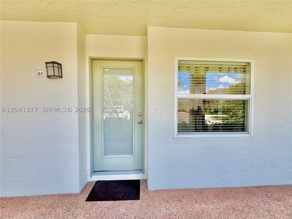 Photo of 1203 Bahama Bnd #G1, Coconut Creek, FL 33066 (MLS # A12041377)