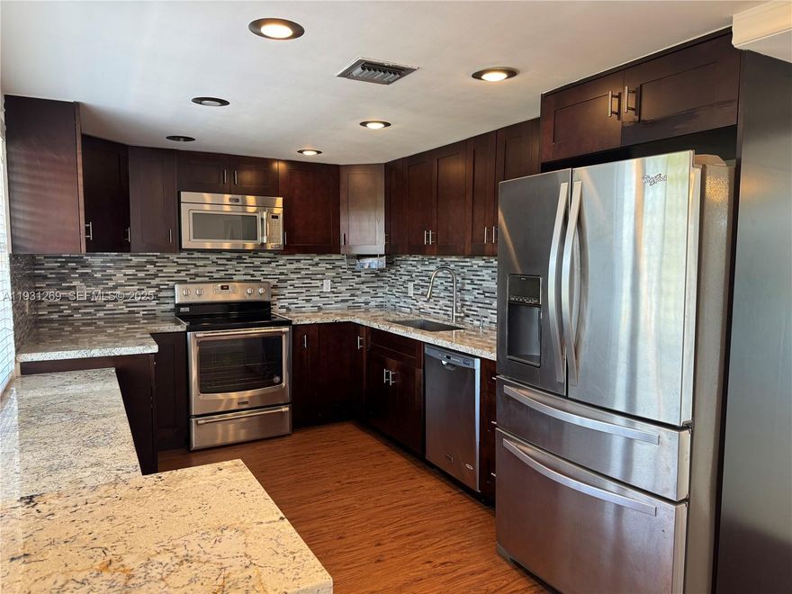 Golf Course & water view condo in desirable Oaks section of Palm Aire Golf community. Large 3 bed/2.5 bath unit has renovated kitchen w/granite counters/stainless steel appl., an open dining/living room area, tile flooring, full-size washer & dryer, no popcorn ceiling, hurricane windows on south side of unit & large screened private balcony.  Water, cable (about 100 channels) & internet incld in maintenance. Bldg is next to the pool & social room/barbecue grill area.  One of best located bldgs- near entrance,  supermarket, tennis courts, city community center, playground & walking/bike path. Min. 700 credit score  & min. of 20% deposit required by assoc. Listing is subject to errors, changes, & omissions without notice, information in this listing is not warranted or guaranteed & must be confirmed by buyer.