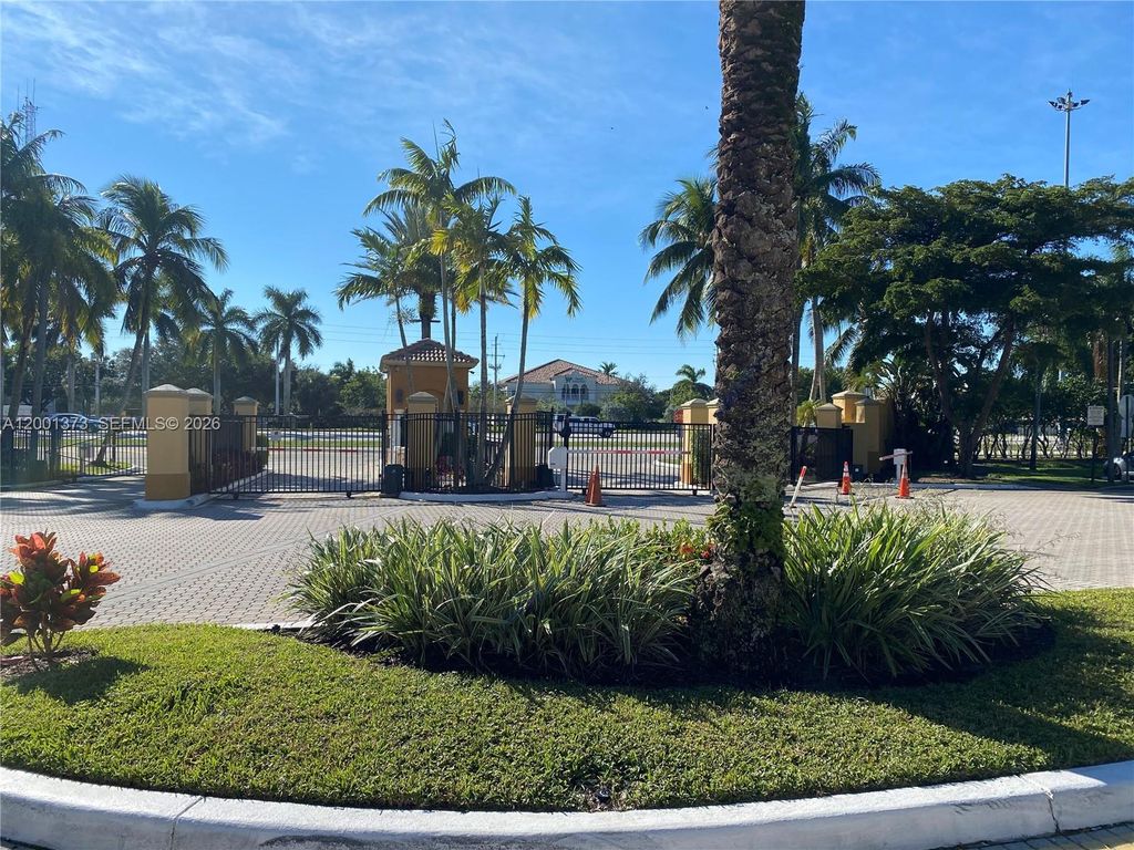Photo of 9645 nw 1st Ct #1-302, Pembroke Pines, FL 33024 (MLS # A12001373)