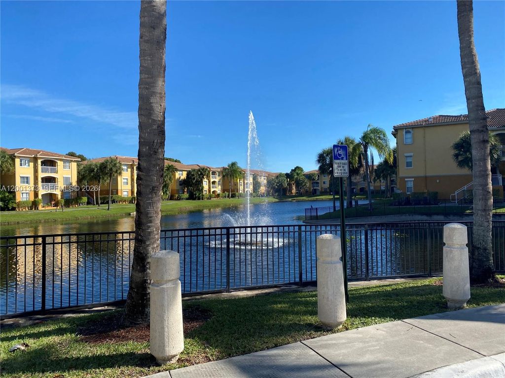Photo of 9645 nw 1st Ct #1-302, Pembroke Pines, FL 33024 (MLS # A12001373)