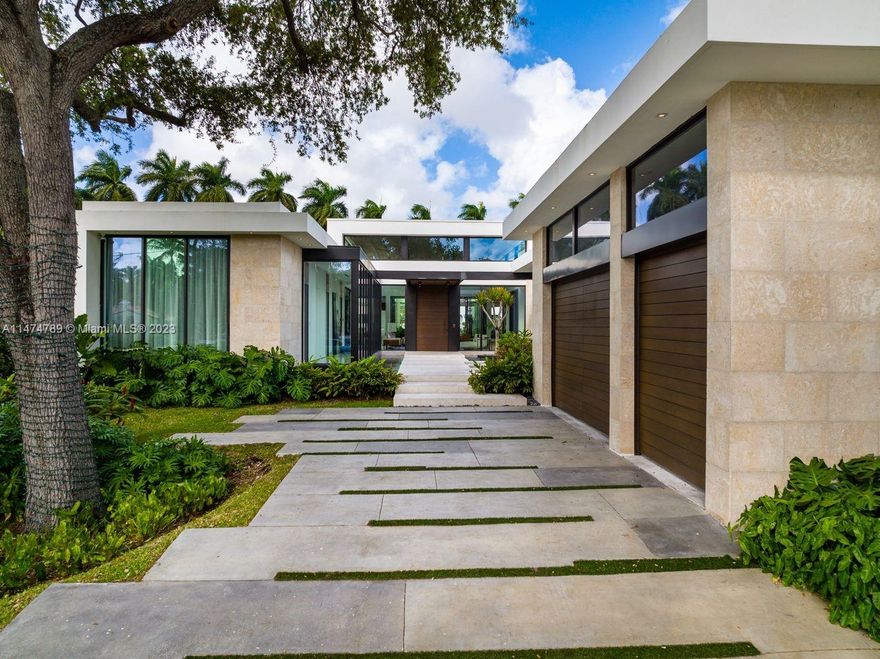 Newest waterfront home in the highly sought after enclave of Belle Meade, an artistic expression of fine living. Modern marvel with a unique open floor plan, capturing the perfect flow between indoor & outdoor Florida living. The design plays off water features, natural light and zen-like atriums. With custom-curated finishes, 6 bed&6.5 baths w/ a unique style. Master suite offers a spa-like bathroom. The entire home is an entertainers paradise, with the focal point being the stunning Mia Cucina kitchen. Fully-equipped summer kitchen, in a tranquil paradise with lush landscaping for privacy. 3 car garage, deep water boat dock with 75 ft. of water frontage with no fixed bridges to the bay. Fully automated smart home integrating the best technology.