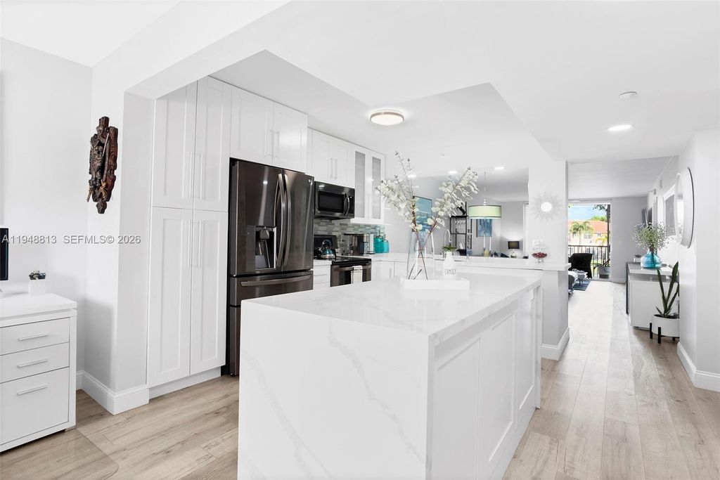 Photo of 7763 Southampton Ter #211, Tamarac, FL 33321 (MLS # A11948813)