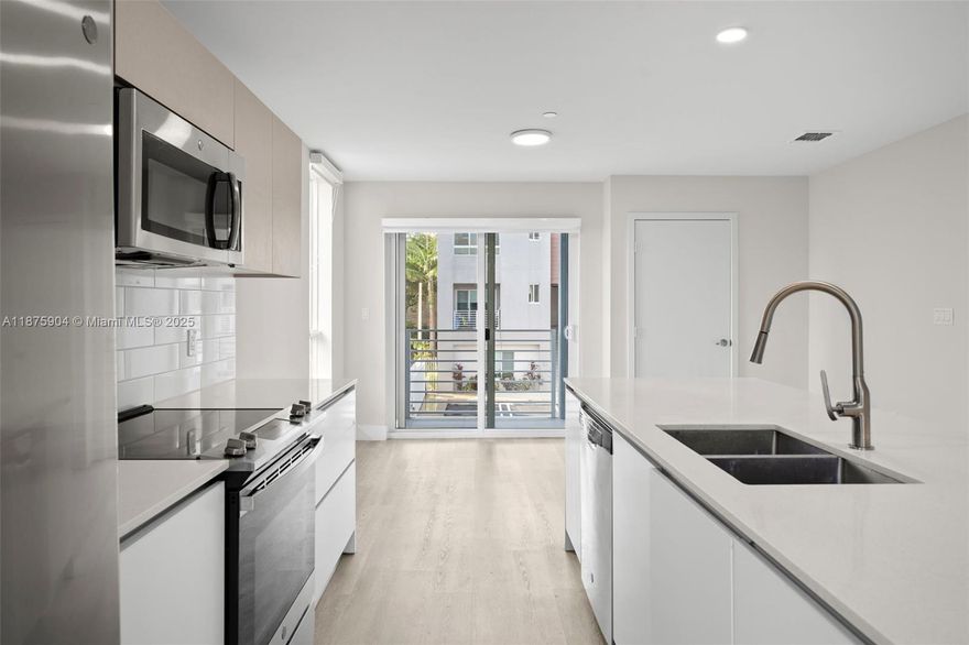 Experience the perfect blend of modern design and comfort in this 2-bedroom, 3.5-bath townhome at Aventura Village. Featuring bright open spaces, high ceilings, and sleek finishes throughout, this home offers a contemporary kitchen with quartz countertops and stainless-steel appliances, impact windows, and private outdoor patio. Both bedrooms include ensuite baths for added privacy, plus a convenient half bath for guests. Gated boutique community just minutes from Aventura Mall, beaches, and top-rated schools. Includes assigned parking and access to landscaped common areas — a stylish urban retreat in the heart of Aventura.