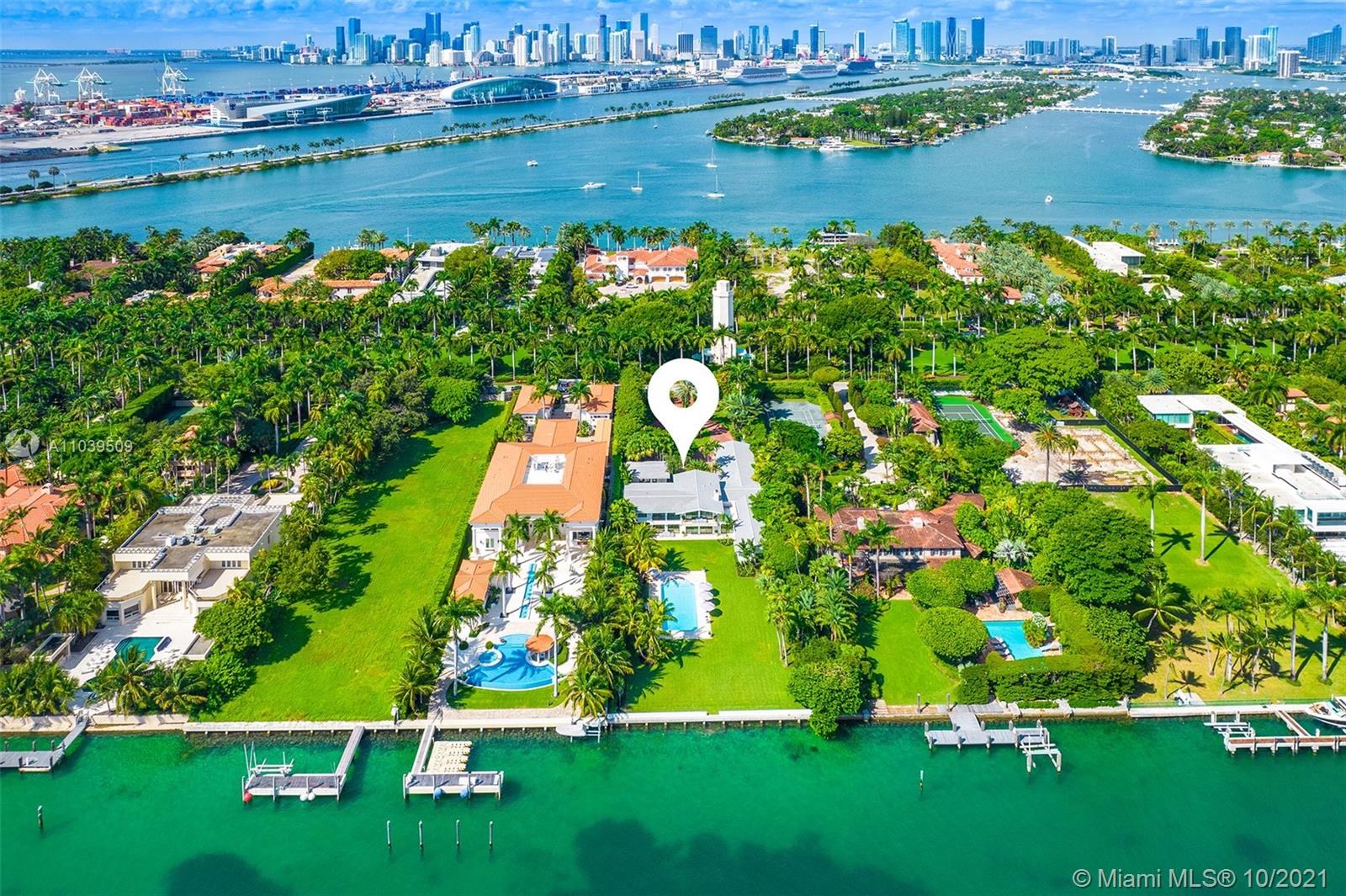 Located on exclusive, guard-gated Star Island, this fully re-imaged and rebuilt Miami Modern house by Todd Michael Glazer occupies an impressive 40,000 sf lot with dockage to accommodate up to 90' yacht only minutes from Miami Beach Marina and open water to the ocean. This 9 BR/9 +1 BA includes separate guest house with kitchen and spacious second floor master suite with balcony overlooking the huge outdoor entertainment space. Lushly landscaped grounds feature tropical foliage, large resort size pool and automatic gate for privacy and security. This estate is truly a one of a kind location with access to endless restaurants and shopping of South Beach, Brickell and the new Design District. Additional 2000 sf added in the new renovation for 8102 sf as per owner.