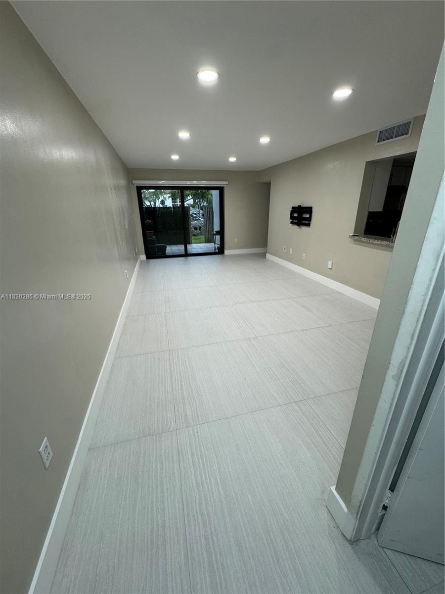 Beautifully renovated 2 Bed/ 2 Bathroom apartment on the first floor in unit washer and dryer within the Heart of Miami. Only 2 Cars Maximum, Very centrally located 20 min from Miami International Airport, 15 min from FIU, and 35 min from the beach. Located in Bleau Fontaine condo association that has 24/7 Security, a pool, and tennis courts. The apartment has newly renovated tile flooring, 2 newly bathrooms all tiled with floating cabinetry, renovated lighting fixtures throughout the apartment. New impact widows in both bedrooms and Impact sliding doors. New Modern Samsung Bespoke refrigerator, New Modern LG front loading washer & dryer, Don't hesitate to call the listing agent for a viewing.