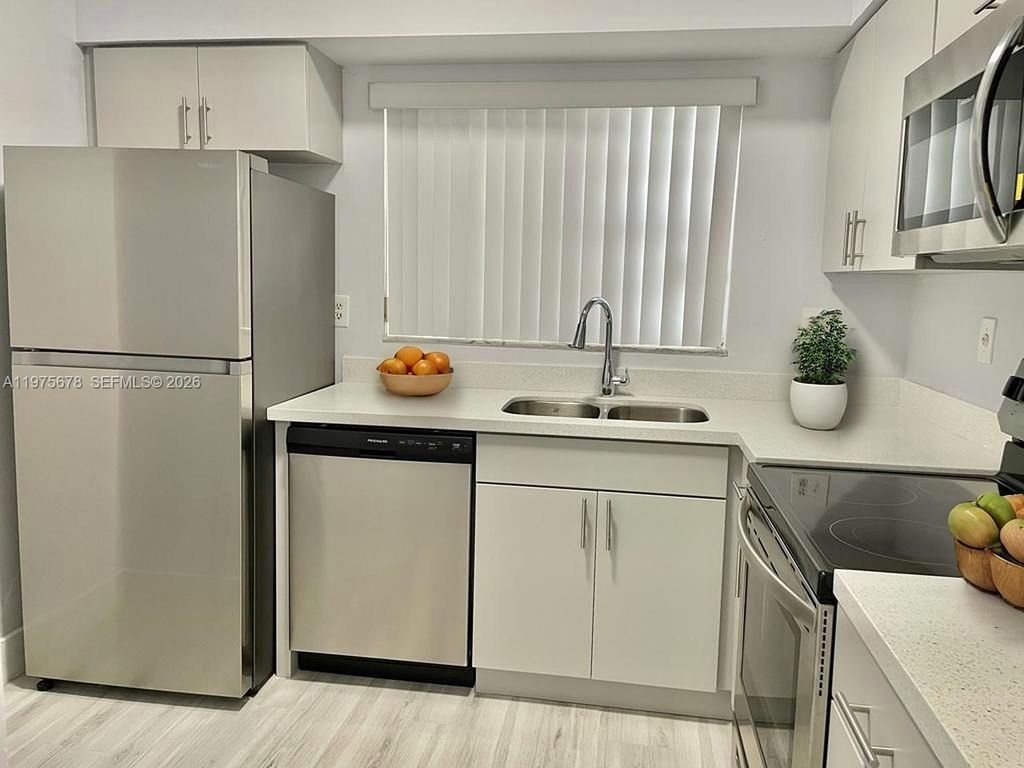 Photo of 1971 NW 96th Ter #9F, Pembroke Pines, FL 33024 (MLS # A11975678)