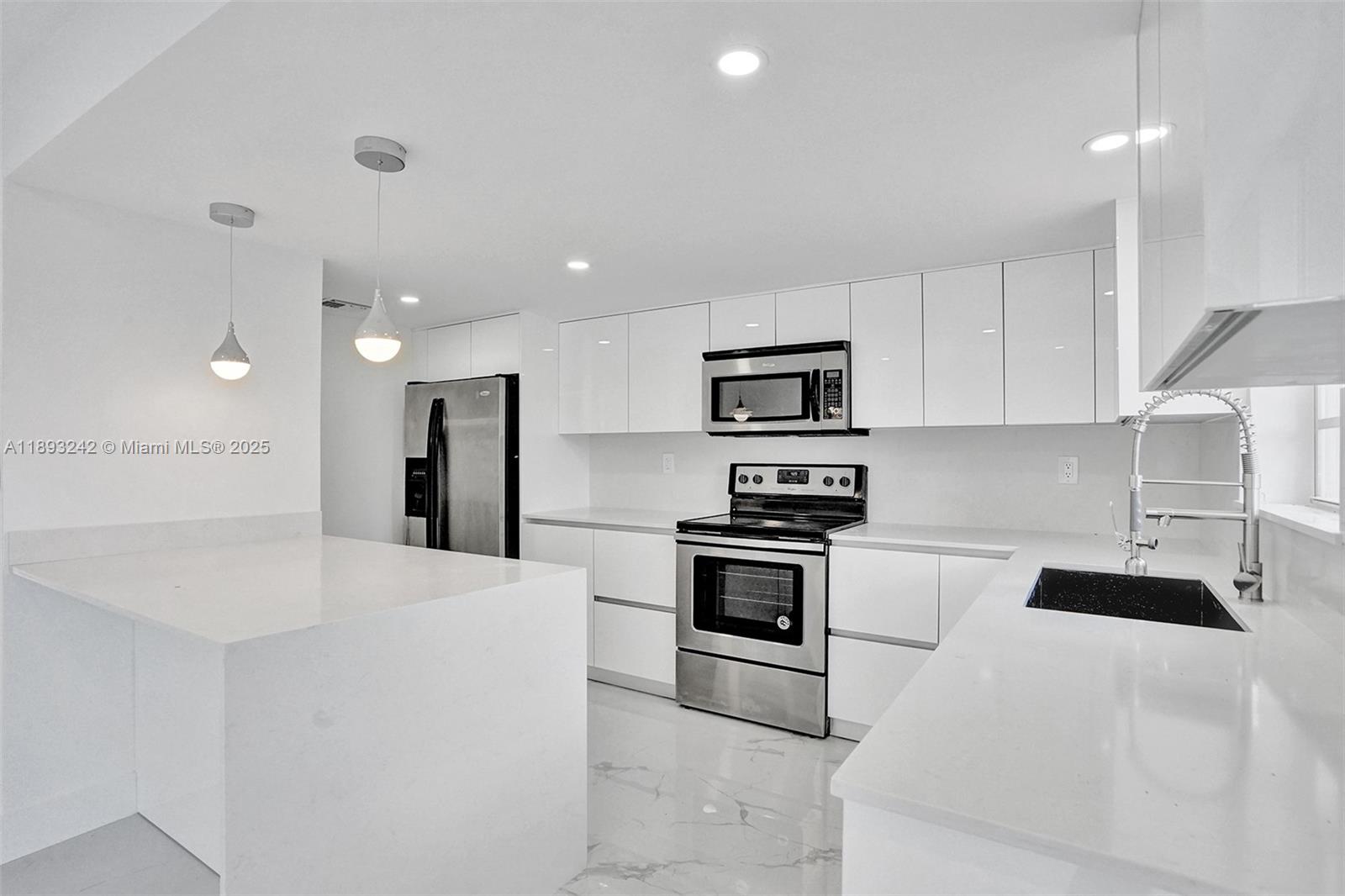 Beautiful completely remodeled 3 bedrooms 2.5 bath townhouse in quiet and tranquil Laguna Club community with over 1500 square feet under A/C. Home features open floor plan that includes brand new flooring, new powder room, new open kitchen with white wood cabinets with quartz countertops, stainless steel appliances including a wine cooler, new washer and dryer in the unit large back patio/terrace for entertaining and 2 assigned parking spaces in front of the home for easy access and parking with plenty of guest parking as well. Some of the amenities include a community pool and clubhouse for parties and get togethers and the location is great just minutes away from FIU and Dolphin Mall and all major expressways and supermarkets. Ready to lease Dec,1,2025 .