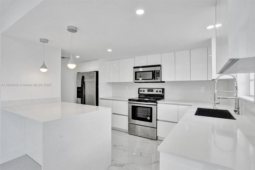 Beautiful completely remodeled 3 bedrooms 2.5 bath townhouse in quiet and tranquil Laguna Club community with over 1500 square feet under A/C. Home features open floor plan that includes brand new flooring, new powder room, new open kitchen with white wood cabinets with quartz countertops, stainless steel appliances including a wine cooler, new washer and dryer in the unit large back patio/terrace for entertaining and 2 assigned parking spaces in front of the home for easy access and parking with plenty of guest parking as well. Some of the amenities include a community pool and clubhouse for parties and get togethers and the location is great just minutes away from FIU and Dolphin Mall and all major expressways and supermarkets. Ready to lease Dec,1,2025 .