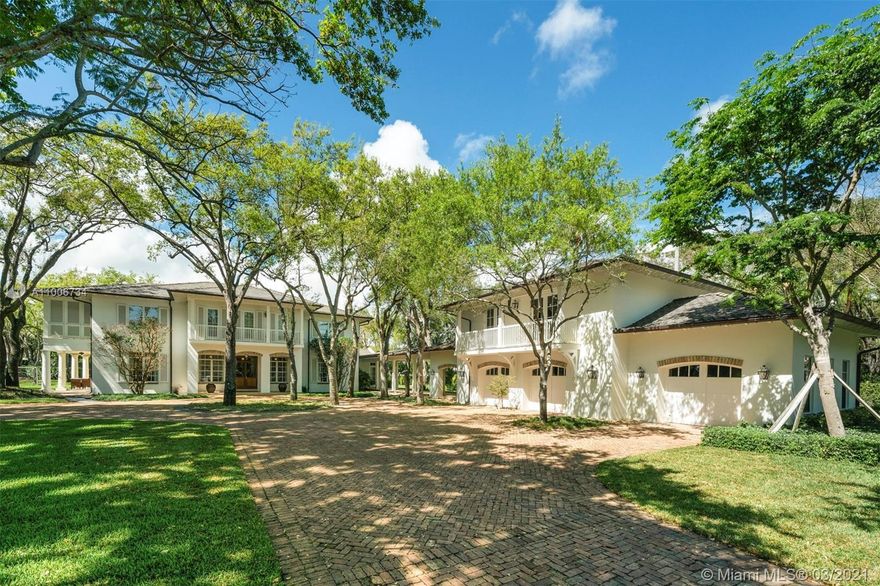 Gorgeous 14,708 Sq. Ft. residence nestled beside a lush, leafy garden in a desirably tranquil cul-de-sac location. This 1.82 acre estate has two living rooms, a welcoming kitchen with breakfast area, formal dining room, seven bedrooms, seven full and two half bathrooms, and a covered terrace surrounded by nature. Finishes include marble and walnut floors and custom built-ins. The main bedroom suite, with two walk-in closets and an elegant bathroom, has a balcony with views of the sparkling pool and Jacuzzi. Designed for comfort and privacy, the estate has two separate and spacious guest suites, suitable for an office, studio, bedroom or gym. With a 3-car garage, plenty of parking space and just minutes away from schools, fine dining and shopping, this home offers the best of both worlds.