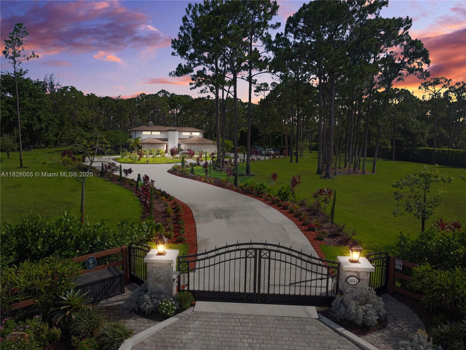 Beautifully remodeled 5-acre estate in the exclusive Caloosa equestrian community. Perfect for horse lovers, with access to an equestrian center featuring jumping rings and paddocks. This private oasis offers a long driveway, butterfly garden, fruit trees, and vibrant wildlife. Main home features high ceilings, chandeliers, Sub-Zero & Wolf appliances, theater room, chapel, split floor plan, and 2-car garage. Includes a guest house with full kitchen and office, screened pool with outdoor kitchen, fire pit, kids’ playground, garden with auto sprinklers, generator, and full privacy fencing.