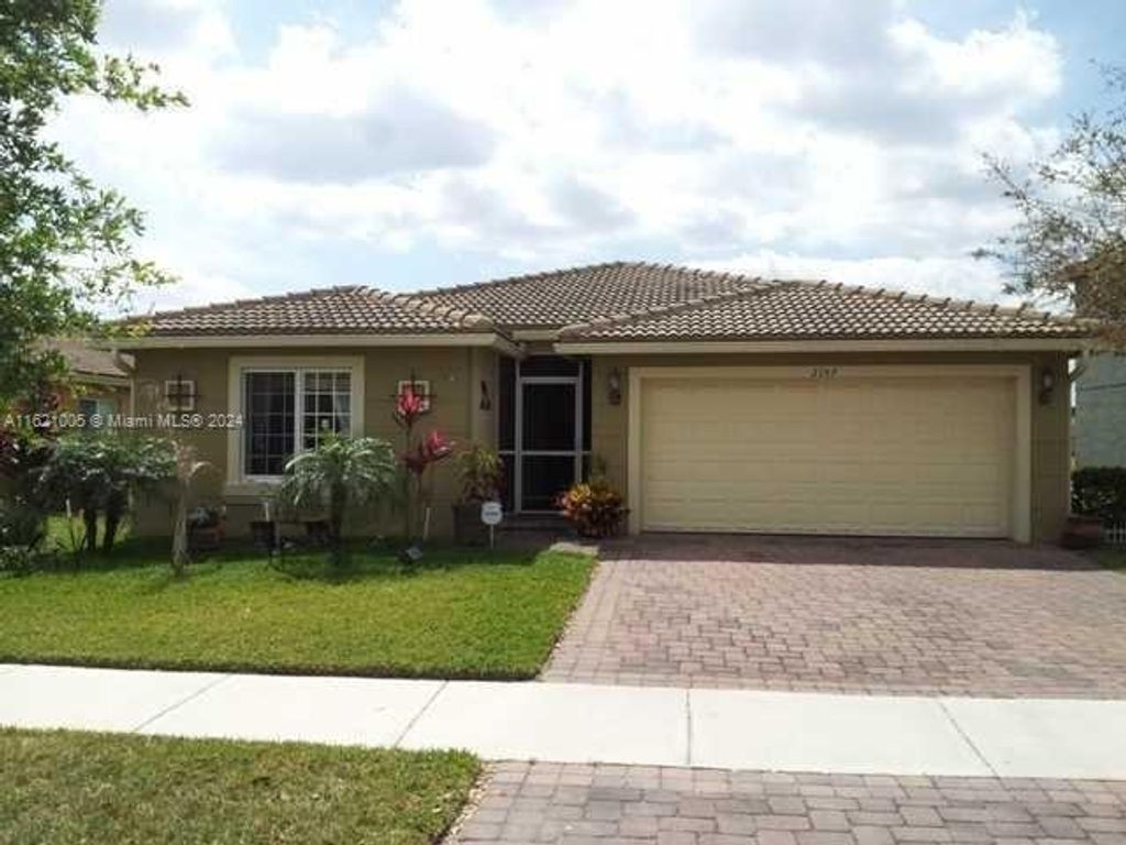 Photo of 2157 SW Newport Isles Blvd, Port Saint Lucie, FL 34953 (MLS # A11621005)