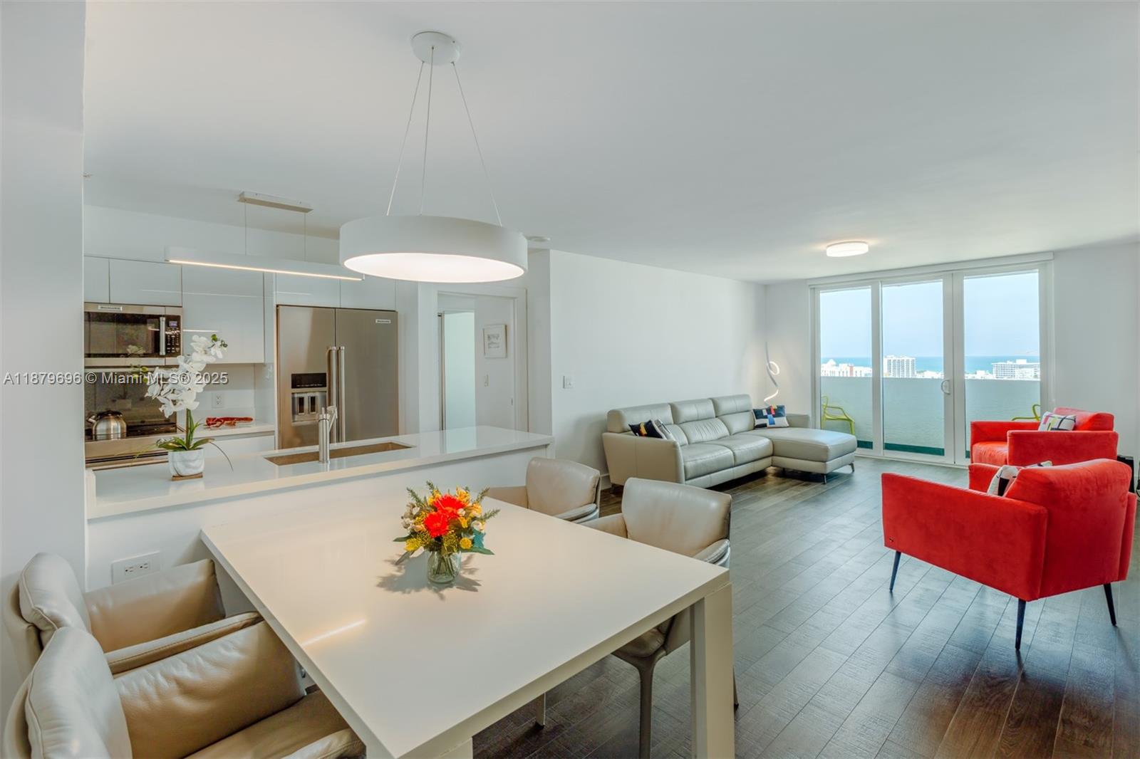 Completely remodeled 2 bed, 2 bath residence in Miami Beach, designed with a spacious split floor plan, open kitchen & large bedrooms with custom closets. Brand new impact windows & doors provide safety, quiet & energy efficiency. Every detail is updated for modern comfort: from quality finishes to smart touches that make living effortless. Ocean & sunrise views fill every window & terrace, bringing natural light & beauty into each room. Thoughtfully styled with sunshades, blackouts & modern lighting, this turnkey home is move-in ready for the season. Fairly priced & offering excellent value, it allows immediate occupancy so you can enjoy Miami Beach at its best. Steps from South Pointe Park, the marina, sandy beaches & world-class dining, it delivers the full South of Fifth lifestyle.