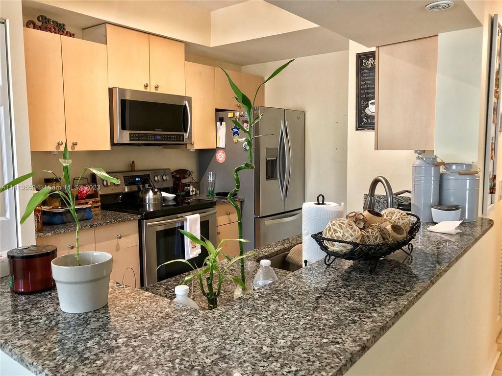 Photo of 2469 Centergate Dr #204, Miramar, FL 33025 (MLS # A11413559)