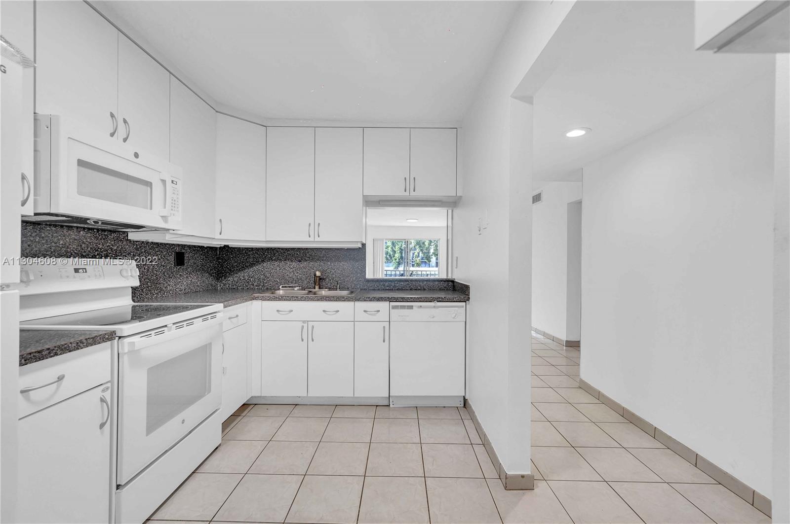 Spacious (1,200+ SqFt) apartment for rent in New Land Gardens. Features new kitchen appliances, tile and carpet floor, central a/c, ample closet space, and a balcony. Building amenities include secure lobby entry, a swimming pool, and parking.