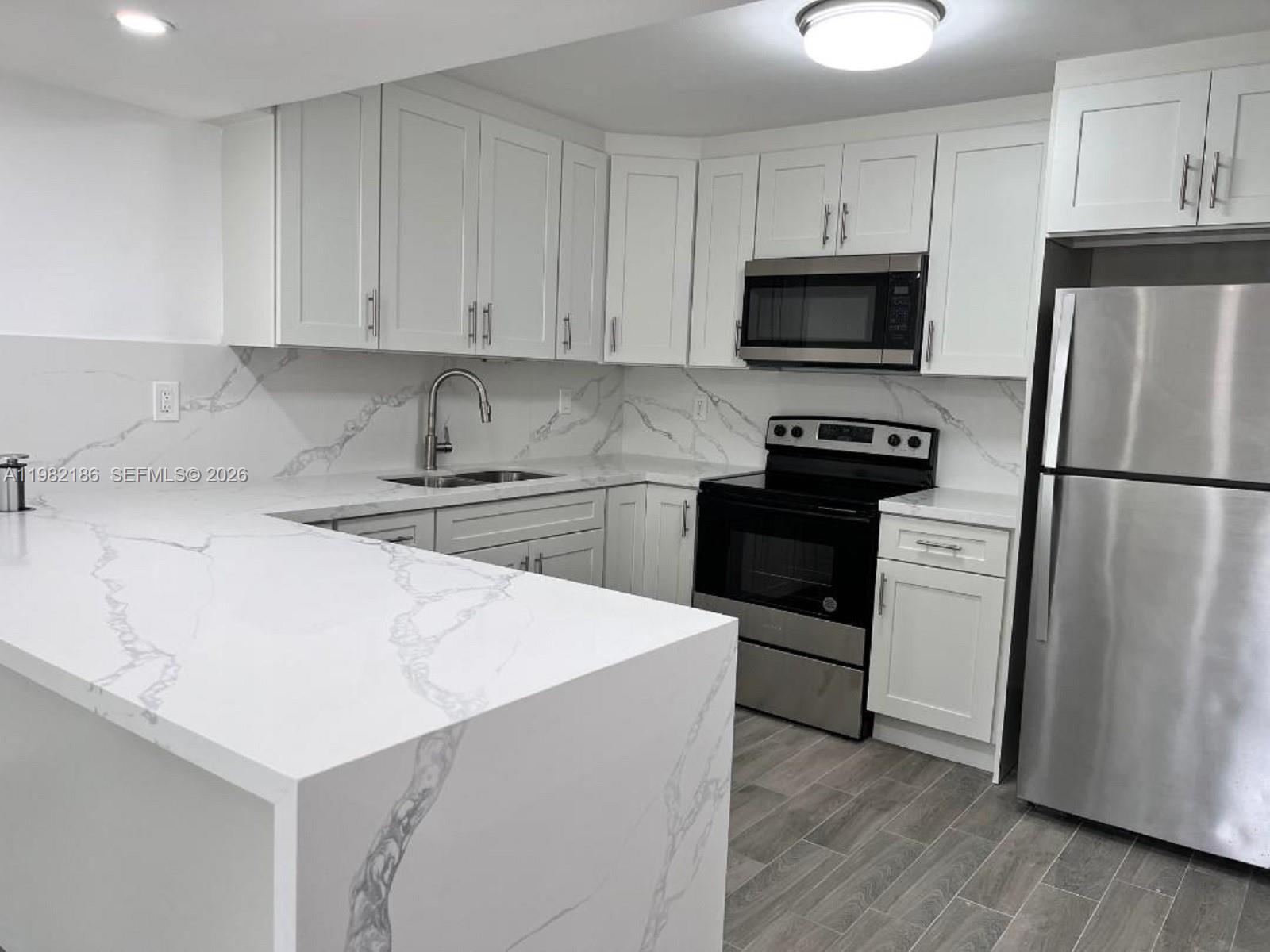 CALUSA CLUB VILG BLDG D - Residential Lease