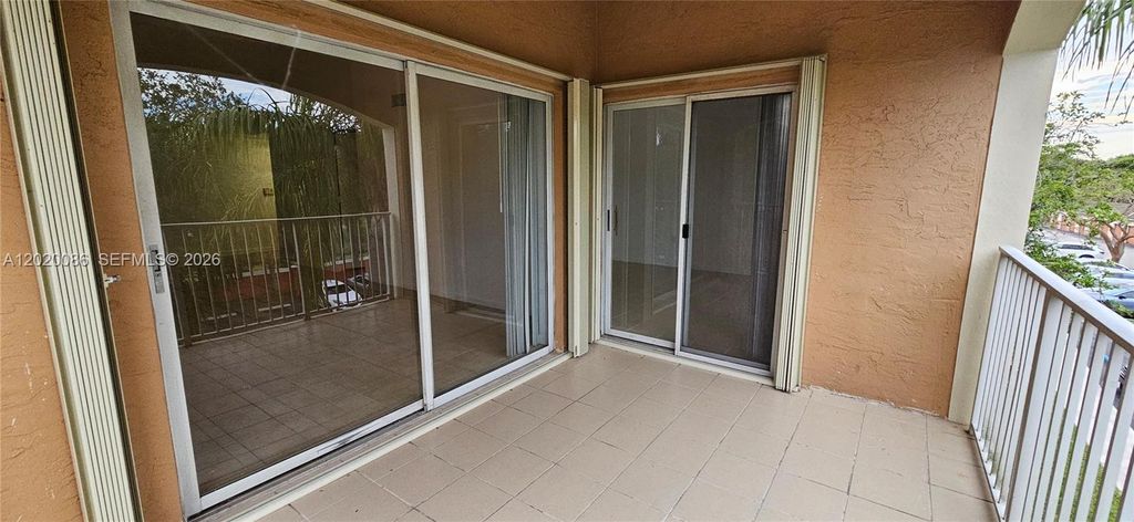 Photo of 3830 Lyons Rd #301-3, Coconut Creek, FL 33073 (MLS # A12020086)