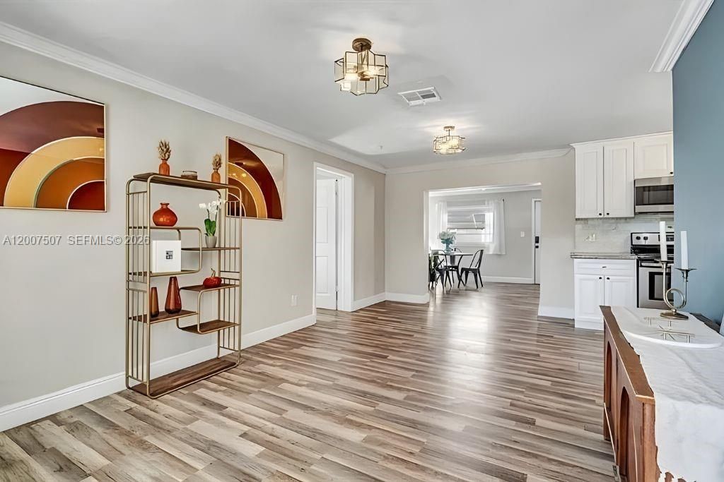 Photo of 6941 boston Dr, Atlantis, FL 33462 (MLS # A12007507)