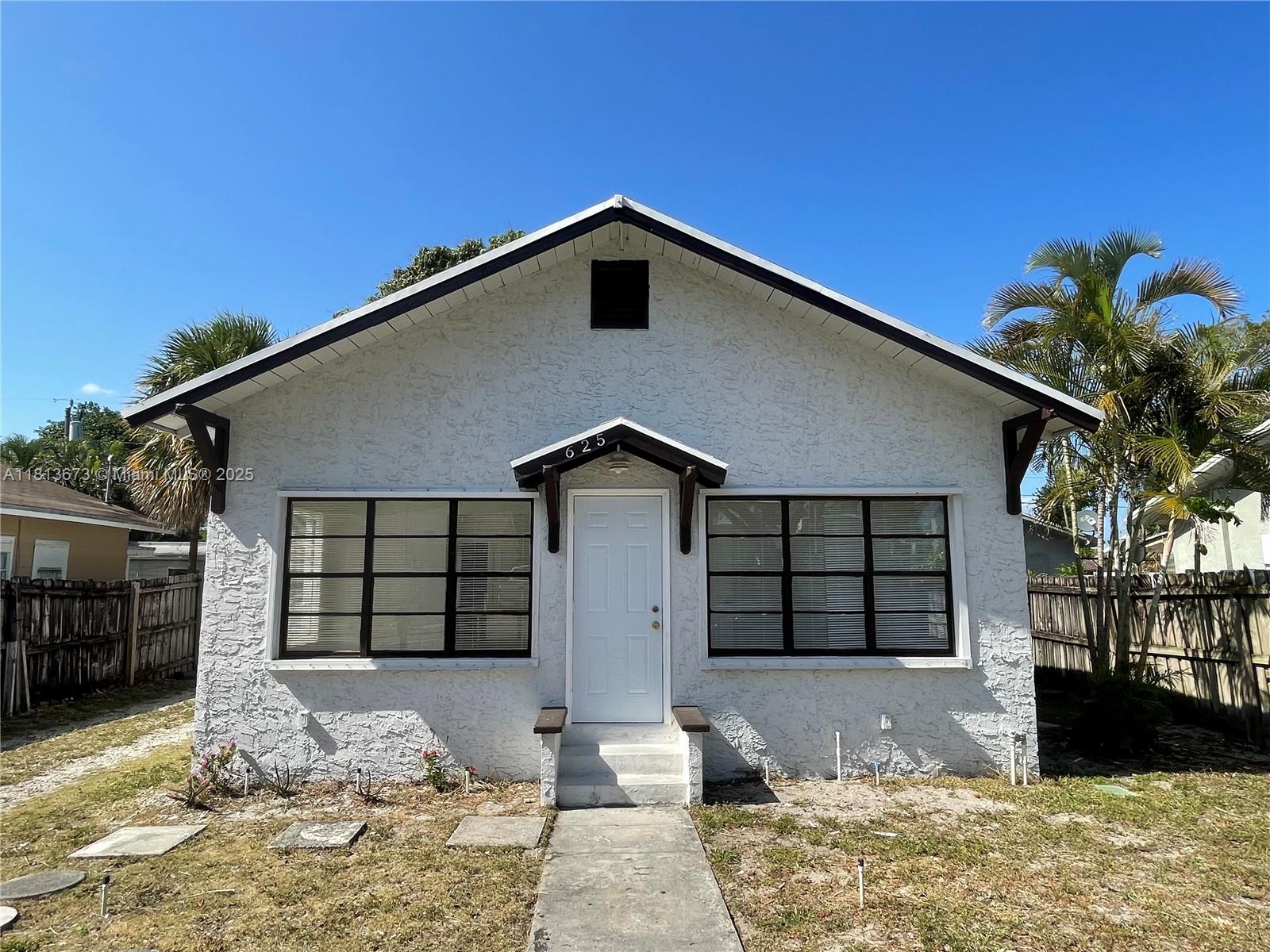 Great location close to downtown West Palm Beach. Ready for a new owner to move in or investors who want a good rental income. House has been updated & painted inside & out. Updated kitchen and bathroom. The Roof is only a few years old. The house has central A/C. Tankless water heater, Stainless Steel Refrigerator, & Gas/Stove sitting area. Plus a front room that can be used as an office, den, or third bedroom. The other two bedrooms have their own hallway with the bathroom. The lot is spacious & has beautiful backyard with mango tree. House has a washer/dyer hook up in the laundry room. Separate Storage shed in the backyard great for storage, lawn equipment & tools.