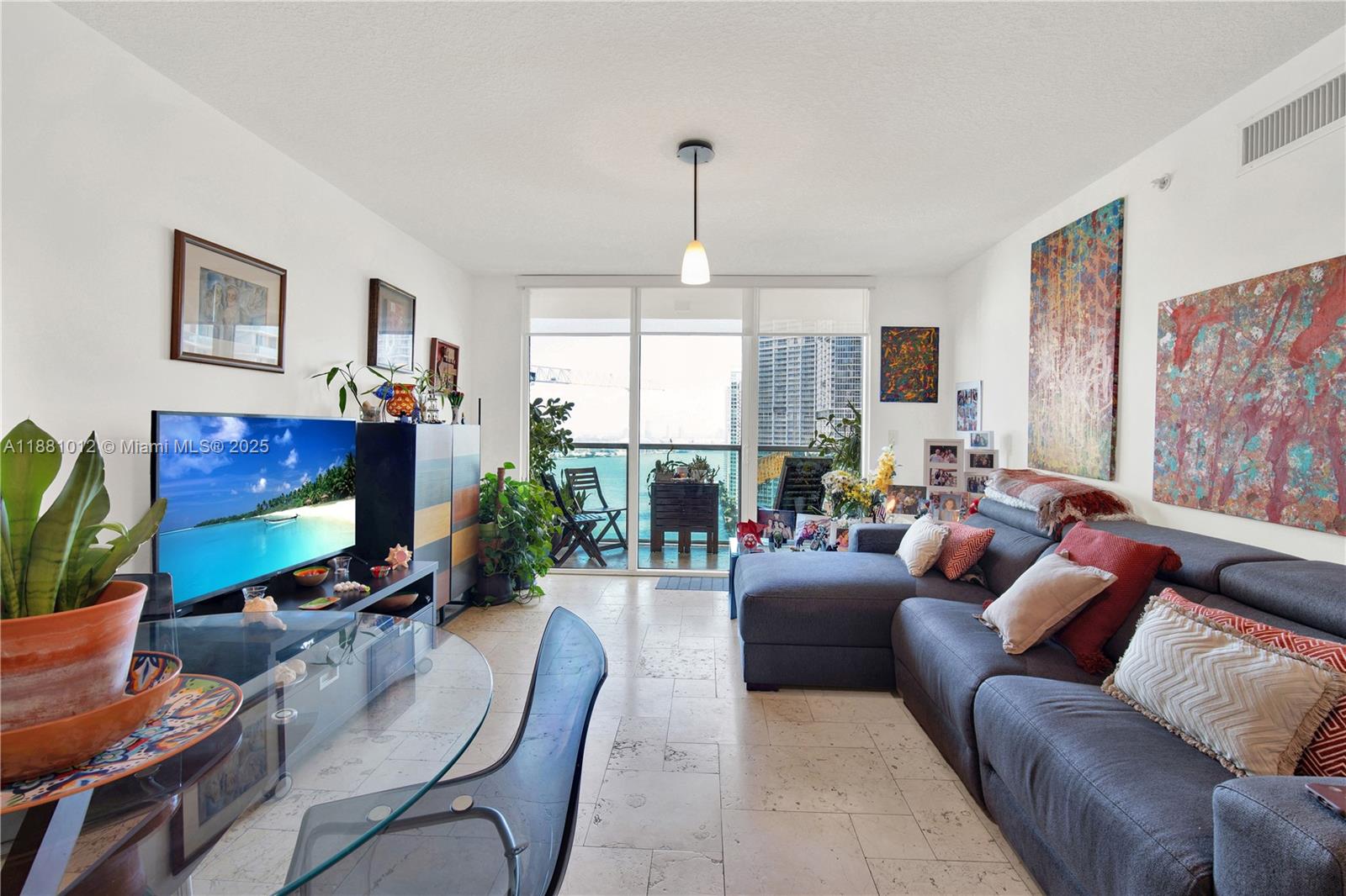 Stunning 2-Bed, 2-Bath Condo with Breathtaking River, Ocean Views in the best location in Brickell – Unit 2910.Live in luxury at Brickell on the River with this exceptional 2-BR, 2- BTH condo on the 29th floor, offering Luxurious Marble & SS Appliances. The Luxury building is located in front of the Miami River with direct access to a walkway along the river and next to a Metromover station that will take you around Brickell and Downtown and connects to Metrorail . Only one block from Brickell City Center providing a wide array of options for shopping. dining and entertainment just around the corner!. This bright and spacious unit features a modern open-concept design, high-end finishes, and a private balcony where you can take in the stunning waterfront scenery.