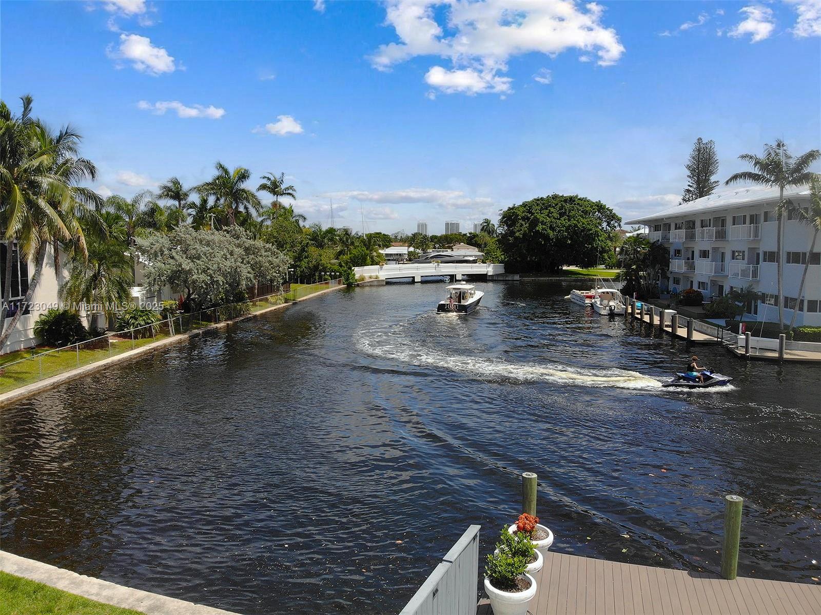 Welcome to the unique city planning that led Fort Lauderdale to be known as America's Venice. A beautiful city known for its 165 miles of scenic inland waterways. Presenting a waterfront home in the prestigious Victoria Park neighborhood, this residence features a private approximately 56-foot dock with no fixed bridges. This space offers serene water views and overlooks the travertine pool area. The sleek, open kitchen is equipped with quartz countertops and stainless-steel appliances. The first floor includes an en-suite guest bedroom and a full bath. On the second floor, you'll find two primary suites, each with a bathroom and private terrace. Additional features of the home include impact windows and a new roof. This property is a few minutes from Las Olas. Boulevard.