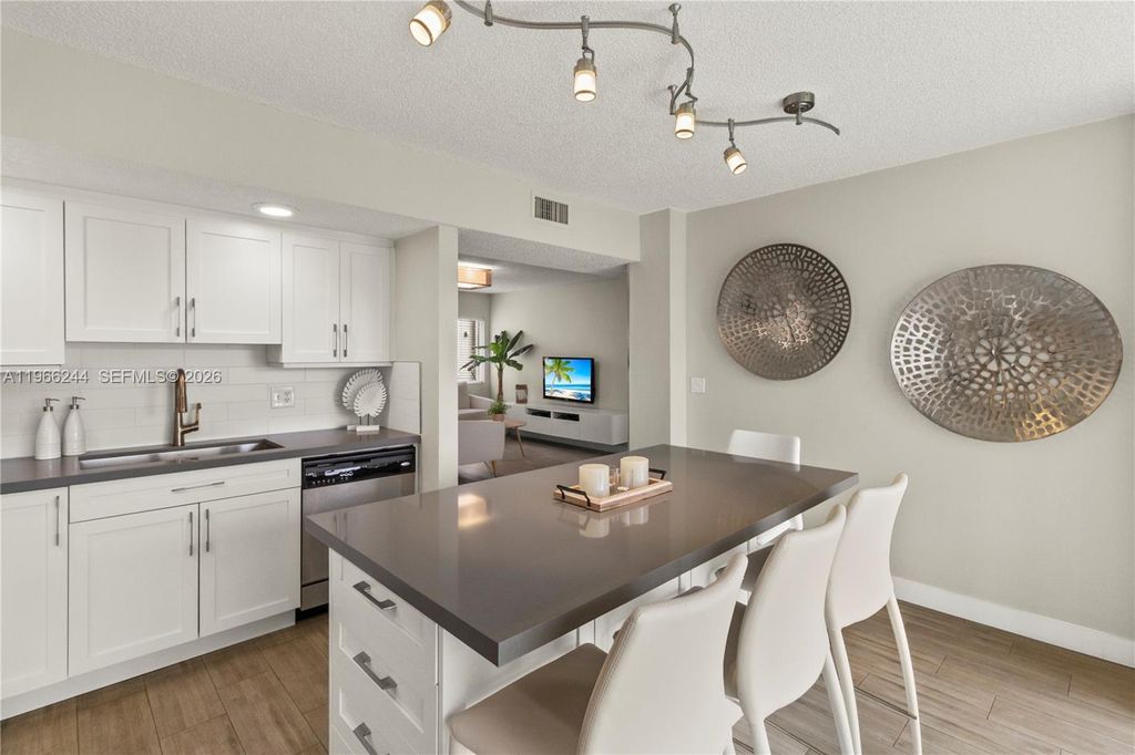 Photo of 5130 Las Verdes Cir #107, Delray Beach, FL 33484 (MLS # A11966244)