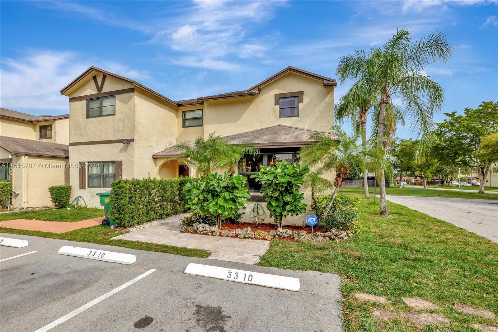 Step into the wonderful embrace of a corner, updated, 2-bedroom, 2-bathroom townhome nestled in a charming area of Lauderhill. This residence boasts a thoughtful layout, with two generously appointed bedrooms,  one downstairs, and the master suite located upstairs. It has a beautiful open floor plan creating a central space for hosting with a fully updated kitchen featuring wood cabinets, granite counter tops, ample storage space, and stainless steel appliances. Enjoy worry free living as the roof has been recently replaced, AC was replaced in 2020, newer washer and dryer, and impact doors and windows with low association fees. This property also features an expansive screened terrace and spacious backyard great for entertaining friends and family.