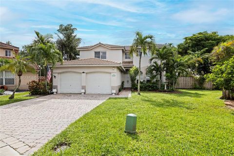 Photo of 13704 S Garden Cove Cir, Davie, FL 33325 (MLS # A11880906)
