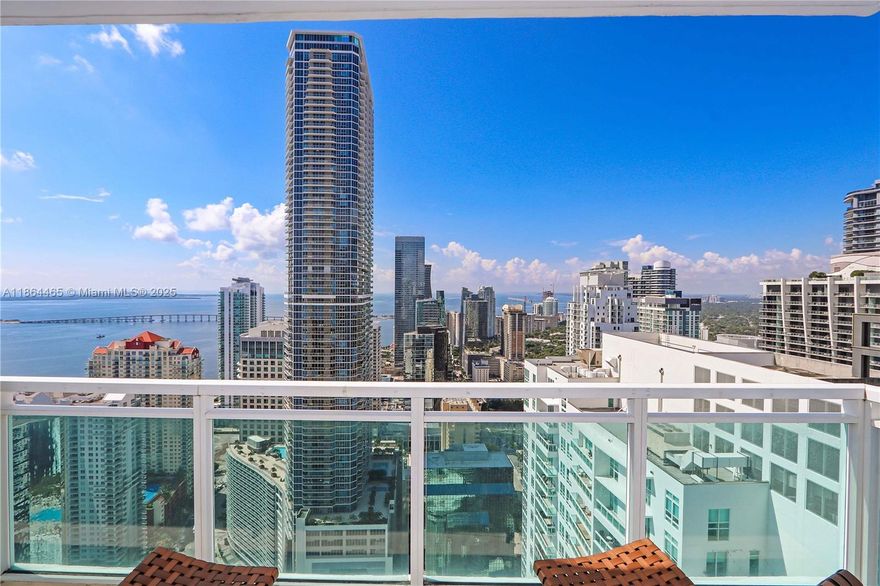 49th Floor 2/2 with spectacular views through 9 ft. tall floor to ceiling windows in the Plaza on Brickell! Bright and vibrant 2bedroom split plan. Furnished with a custom Green Wall that adds an energetic accent to the unit, and electric blinds throughout. Situated in the very best area of Brickell, steps to Mary Brickell Village, Brickell City Center, Metro mover & the finest restaurants in Miami! This pet-friendly building includes STATE-OF-THE-ART fitness center, steam room, clubroom, children's room, business center, 10 guest movie theatre, 2 infinity Pools, Spa, and Jacuzzi & Valet Parking. Walking distance to Brickell City Center, Mary Brickell Villages, Shops, Banks, Restaurants, Pharmacy, and Publix. Just 15 minutes to Miami Int. Airport or Port of Miami.