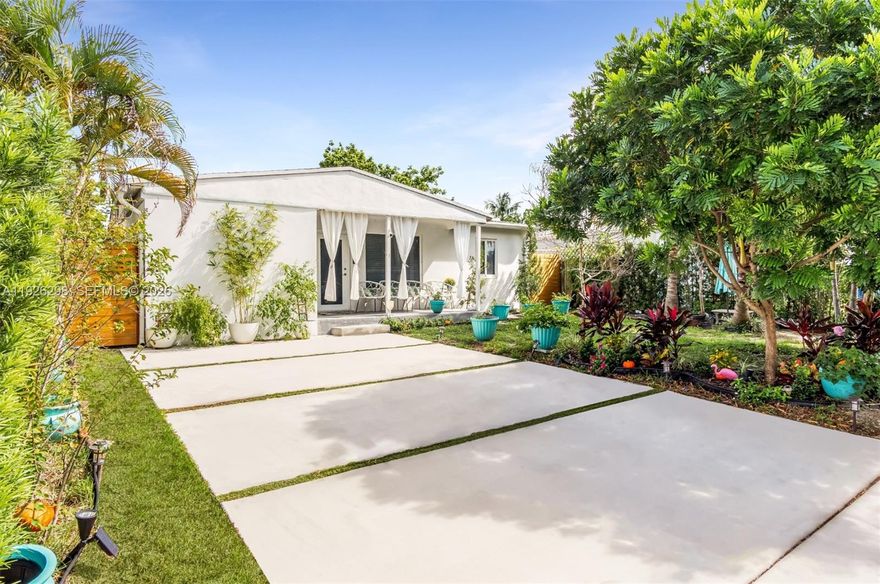 Escape to a charming oasis! This 2 bedroom 2 bathroom home welcomes you with beautiful terrazzo flooring, a modern kitchen featuring quartz stone, stainless steel appliances, natural light and an extra space w/ laundry, pantry eat-in area. Snuggle up on the covered patio areas, ideal for morning coffee or evening stardazing. The large backyard is a private retreat, with fruit trees and a she-shed equipped with a portable AC making it an ideal studio space or office. The front yard has a new 4-car driveway and loads of curb appeal. Roof 2021 & Carport was enclosed lending more space to do as you please. Prime location, take a stroll to nearby shops, supermarkets, pharmacy, gym, and park-or hop on I-95 just around the corner. A beach getaway to Lauderdale-by-the-sea is just 10 mins up the road!