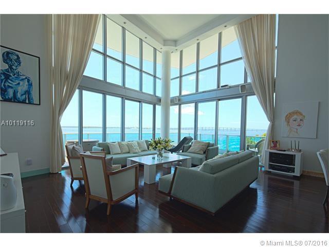 This 2669 SF loft is the largest in the building and has spacious 3 bed/3.5 bathrooms. Spectacular with 18' ceilings, impact glass provide light and a gorgeous view that will never be obstructed. Project a movie to the wall and enjoy the surround sound system. There are three levels and privacy, with two entrances from the 4th and 6th floors. Enjoy six terraces, over 1200 sf of breeze-filled outdoor area.