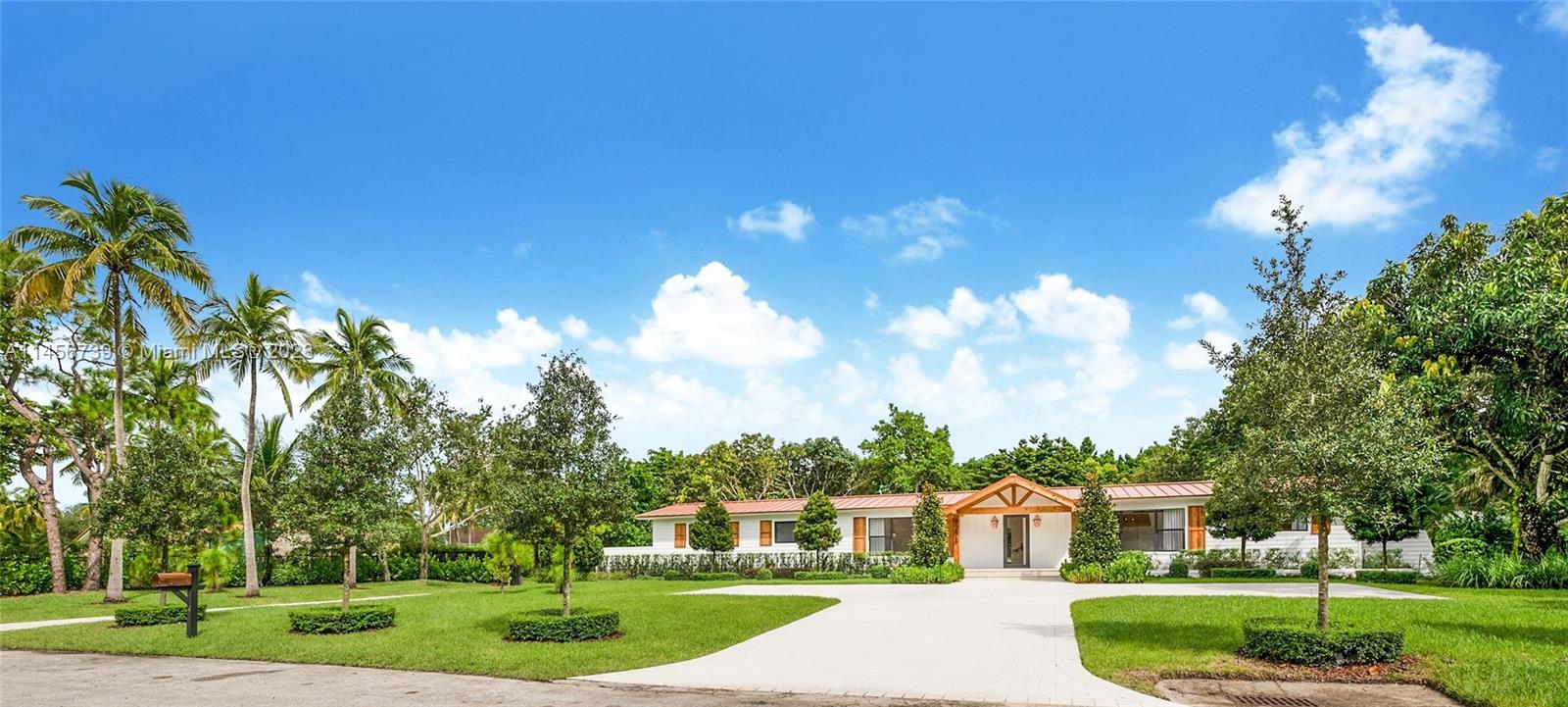 Modern farmhouse on a quite street in the Galloway area! Drive up to cedar columns, shellstone pavers, electric gate & picturesque landscaping. 4/4 walk-in closets. Situated on 39,204 sqft w/ mature fruit trees. Excellent floor plan w/ primary bed on 1 side & 3 beds on other side, 1 bed can be a 2nd primary or inlaw suite. 2 car garage, original wood floors, porcelain tiles, metal roof, impact windows/doors, 2 central A/C units + 3 mini-splits included in garage, upgraded light fixtures, int/ext sound system, 2 washer/dryer in 2 laundry areas, shaker interior doors, window treatments, barn doors. Eat-in kitchen features white shaker cabinets, kitchenaid appliances, Calacatta quarts counters. Enjoy the outside year round w/ resort style pool, shellstone pavers,outdoor kicthen.