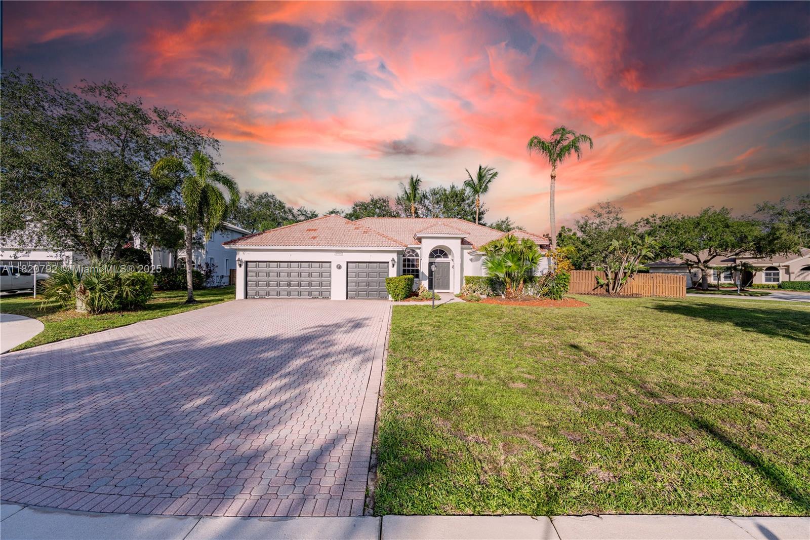 Open House July 12th & 13th 12:00 p.m. - 2:00 p.m.
Welcome to this beautifully maintained single-story home in Stoneridge Lake Estates, featuring ceiling heights as high as 11 feet, 4 spacious bedrooms, 3 full baths, and a rare 3-car garage on one of the largest corner lots in the community with lush landscaping and multiple fruit trees. Enjoy a private backyard oasis with an in-ground pool, a 2024 pool pump, and 2025 sprinkler system—perfect for entertaining or relaxing. The home offers fresh exterior paint, 2024 accordion shutters and water heater, and recently cleaned AC ducts, with the community pickleball court just steps behind. Residents enjoy a host of amenities including 24-hour gated security, ADT security, Comcast cable, tennis and pickleball courts.