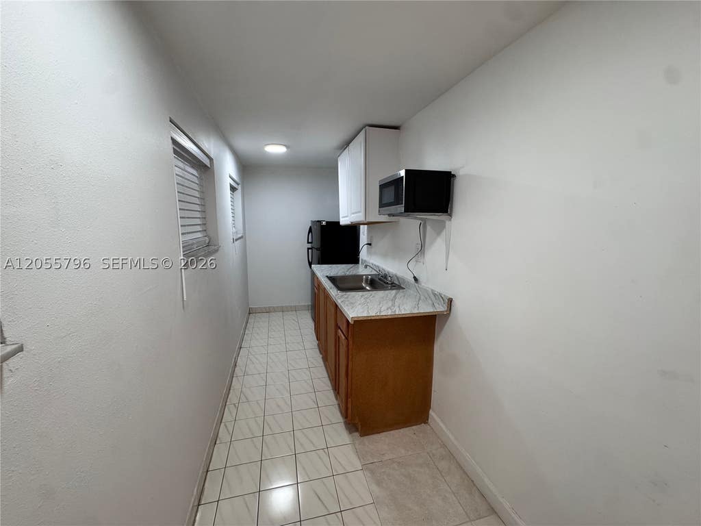 Photo of 719 Glenn Pkwy #E, Hollywood, FL 33021 (MLS # A12055796)