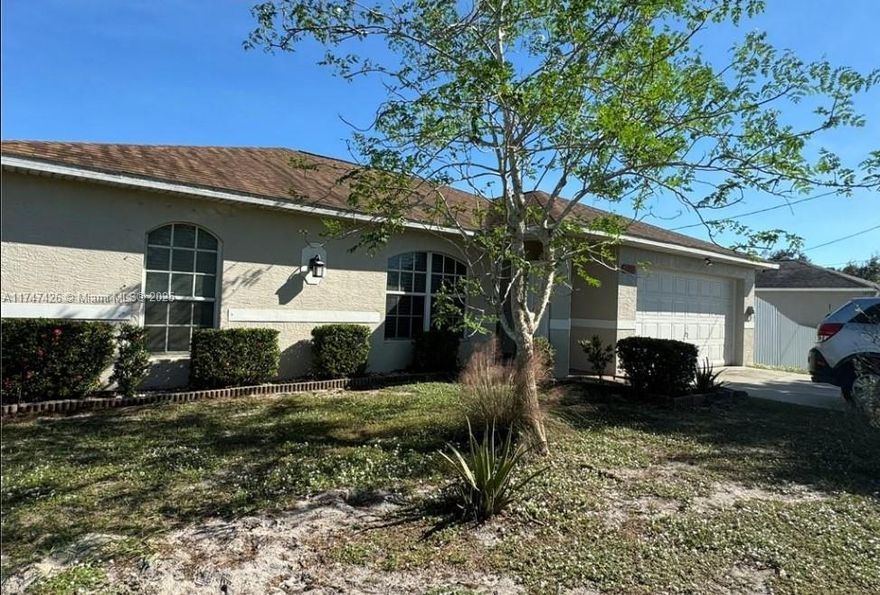 Beautifully remodeled home with in-law quarters and stunning outdoor space. Located in a highly desirable area close to schools, shopping, restaurants, and major roads making it an ideal choice for families or those who love convenience. The garage has been expertly converted into a guest or in-law quarters. Step outside to your private oasis - a large screened in lanai with a hot tub, perfect for relaxing in the evenings. The lot is surrounded by an aluminum fence for privacy and features a variety of fruit trees, a storage shed, and ample space for outdoor activities. This property is being sold by a motivated seller. Schedule your showing today!