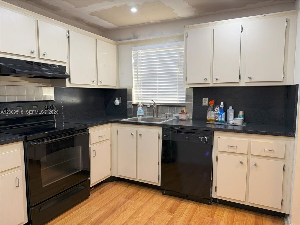 Photo of 10467 Sunrise Lakes Blvd #205, Sunrise, FL 33322 (MLS # A12009518)