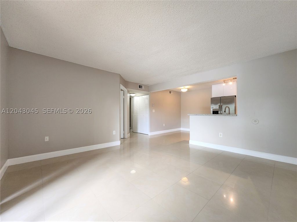 Photo of 251 Palm Cir W #204, Pembroke Pines, FL 33025 (MLS # A12043045)