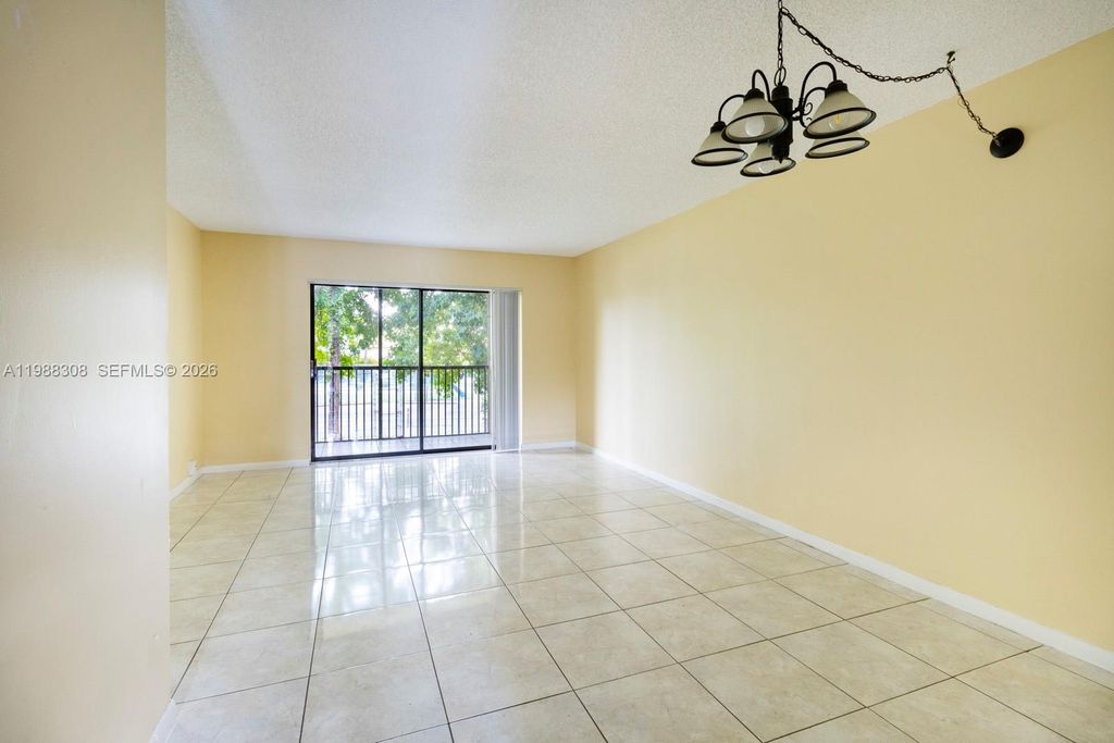 Photo of 9044 NW 28th Dr #3-302, Coral Springs, FL 33065 (MLS # A11988308)