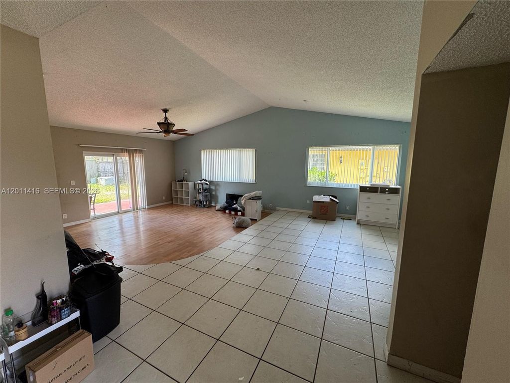 Photo of 8700 NW 46th Ct, Lauderhill, FL 33351 (MLS # A12011416)