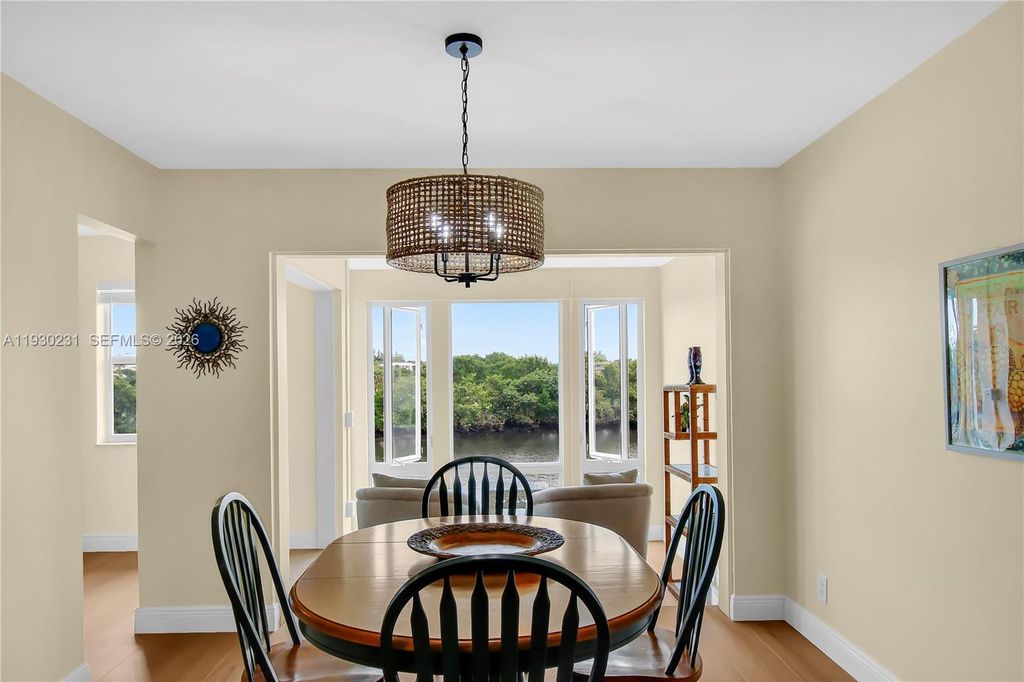 Photo of 7 Colonial Club Drive #302, Boynton Beach, FL 33435 (MLS # A11930231)