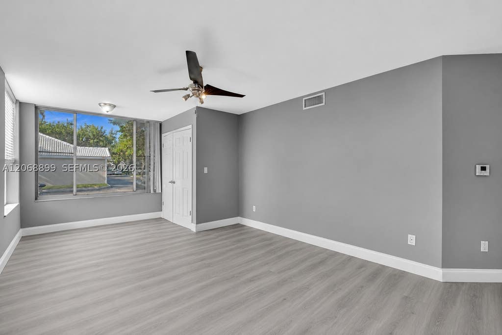 Photo of 2881 N Oakland Forest Dr #112, Oakland Park, FL 33309 (MLS # A12068899)