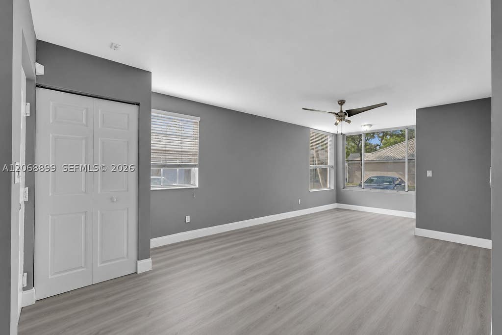 Photo of 2881 N Oakland Forest Dr #112, Oakland Park, FL 33309 (MLS # A12068899)