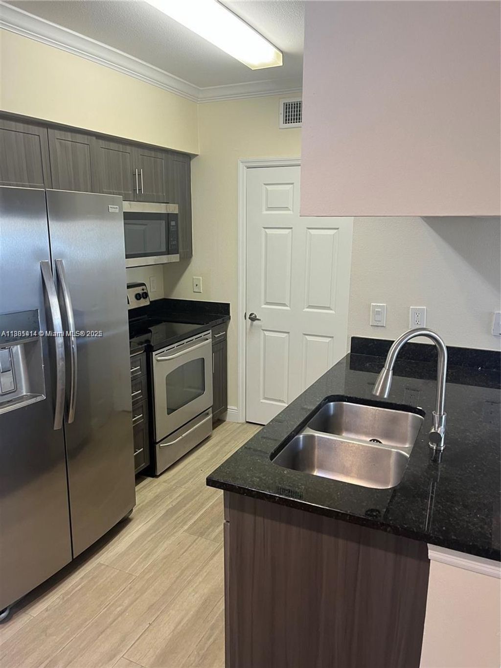 Photo of 6492 Emerald Dunes Dr #103, West Palm Beach, FL 33411 (MLS # A11881414)