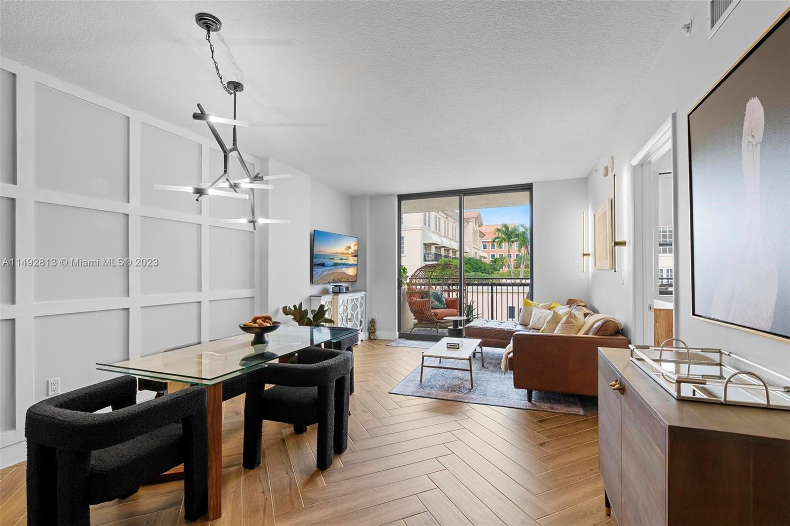 A great opportunity to live in a luxurious full service building in the heart of Coral Gables. Feel at home in this fully furnished 1 bed, 1.5 bath apartment. You’ll fall in love with the open floor plan, fully equipped kitchen, contemporary furnishings and quality mattress. Providing you with exceptional city views from an oversized balcony. 55 Merrick offers a  24/7 Front Desk, valet-parking and security. Amenities include: resident lounge with complimentary wifi, pool tables, 24HR fitness center, pool/hot tub. 1 assigned parking space. Steps away from cafes, dining & bars, all that Giralda Ave and Miracle Mile have to offer. Walking distance to The Plaza Coral Gables plus quick access to the Shops at Merrick Park, Granada Golf Course and UM. 15 mins from MIA International Airport.