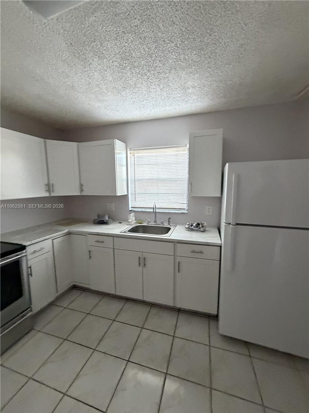 Photo of 8936 NW 21st St #7, Pembroke Pines, FL 33024 (MLS # A11962561)